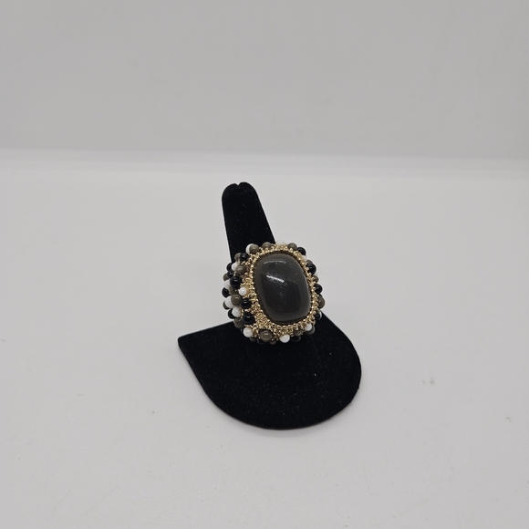 large stretch ring with gray-green cabochon and small black and white balls - Picture 1 of 5